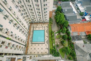 Outdoor pool - Simple And Cozy Living 2Br At Cibubur Village Apartment (Depok)