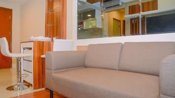 Habitación | Área de sala de estar | Televisión