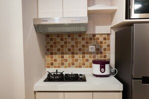 Room | Private kitchen - Relaxing 2Br Signature Park Grande Apartment (Jakarta)