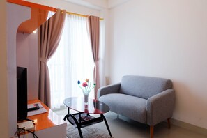 Room | Living area | TV - Cozy And Minimalist 2Br Apartment @ Signature Park Grande (Jakarta)