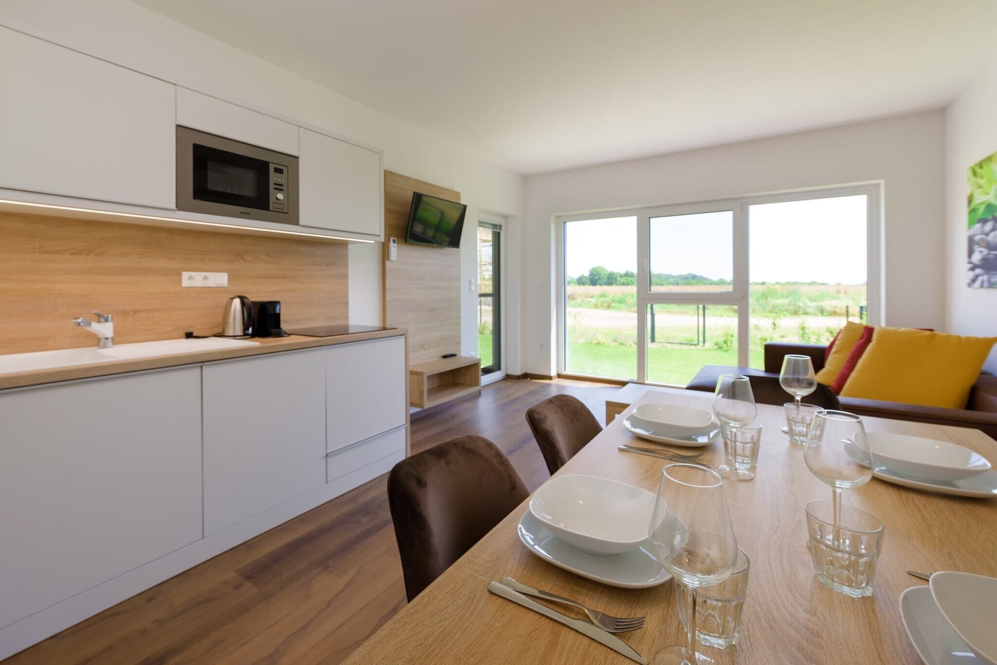 Frigorifero, microonde, piano cottura, lavastoviglie