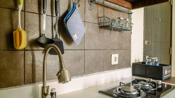 Fridge, stovetop, cookware/dishes/utensils