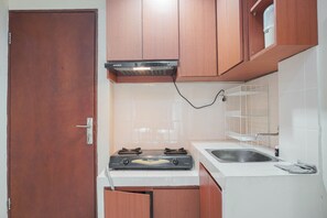 Room | Private kitchen | Fridge, stovetop, cookware/dishes/utensils - Comfortable And Combined 3Br At City Park Apartment (Jakarta)