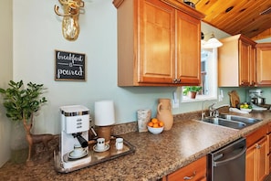 Coffee/tea maker, fridge, microwave, oven