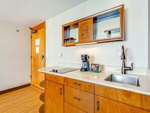 Fridge, microwave, stovetop, coffee/tea maker