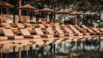 Outdoor pool, open 8:00 AM to 9:00 PM, pool umbrellas, pool loungers