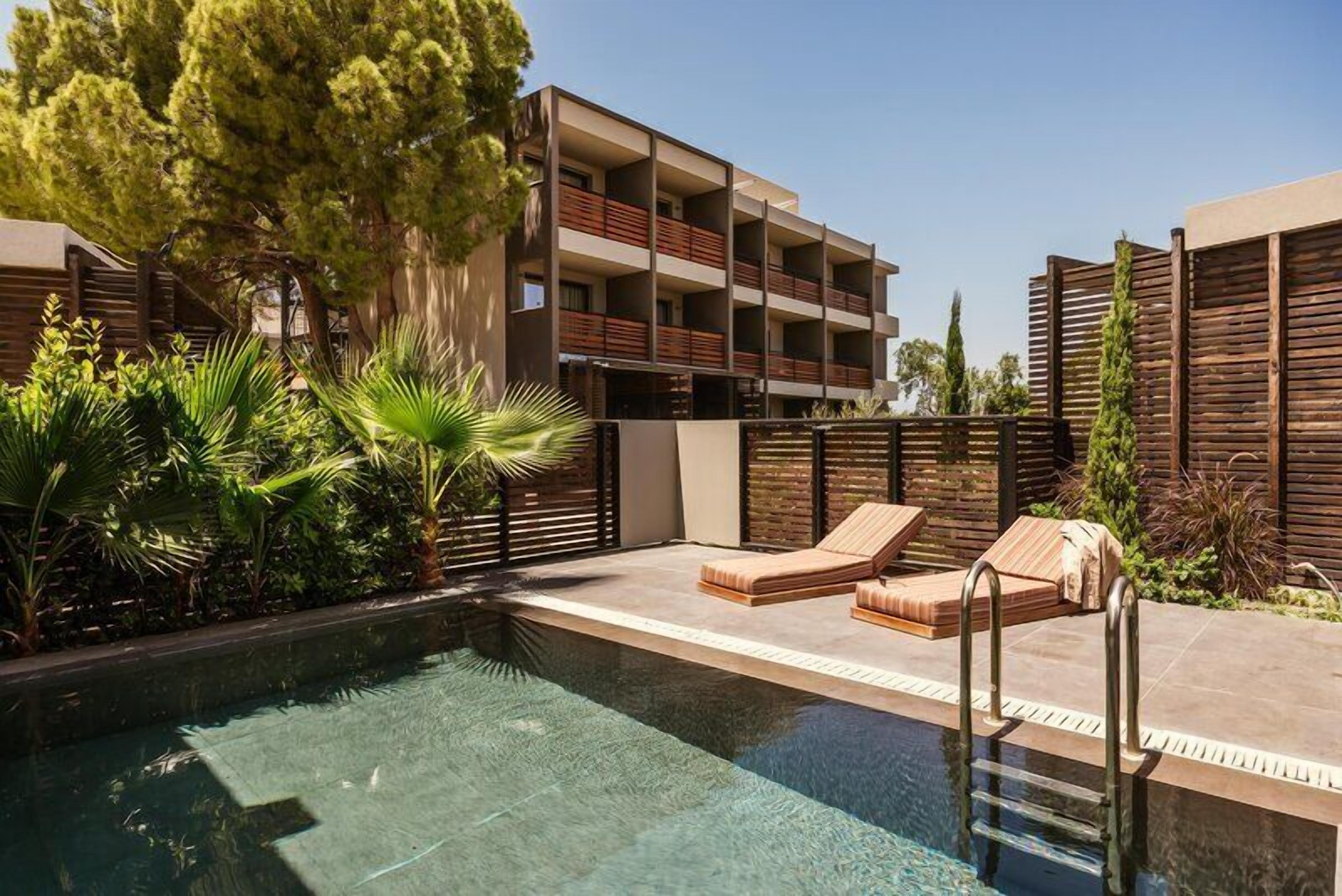 Suite with Private Pool | Pool | Outdoor pool, open 8:00 AM to 9:00 PM, pool umbrellas, sun loungers