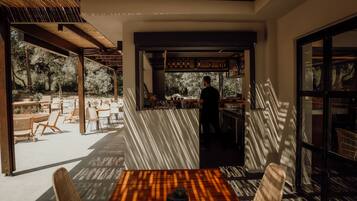 Rooftop bar, garden views, open daily