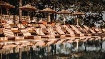 Outdoor pool, open 8:00 AM to 9:00 PM, pool umbrellas, sun loungers