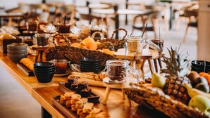 A buffet table with various food items and beverages. - Cook's Club Ialysos Rhodes (Rhodes)