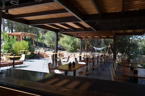 Rooftop bar, garden views, open daily