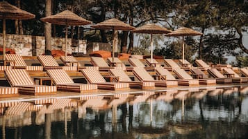 Outdoor pool, open 8:00 AM to 9:00 PM, pool umbrellas, sun loungers