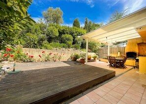 rear terrace of the house with barbecue