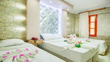 Honeymoon Triple Room | Premium bedding, minibar, free WiFi, bed sheets