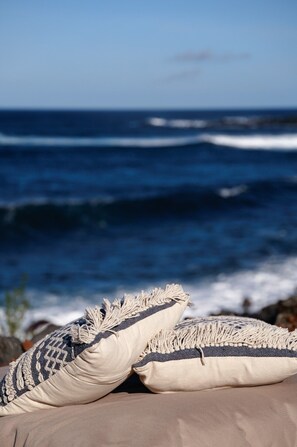 On the beach, sun loungers, beach towels