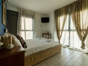 Apartemen Deluks | 4 kamar tidur, setrika/meja setrika, dan Wi-Fi gratis