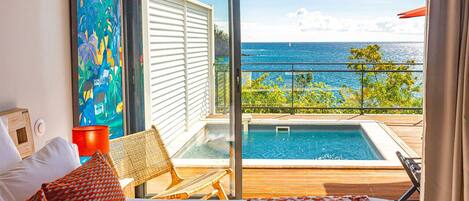 Suite, vue mer, grand bassin privé, terrasse privée | 1 bedroom, free minibar items, in-room safe, blackout curtains