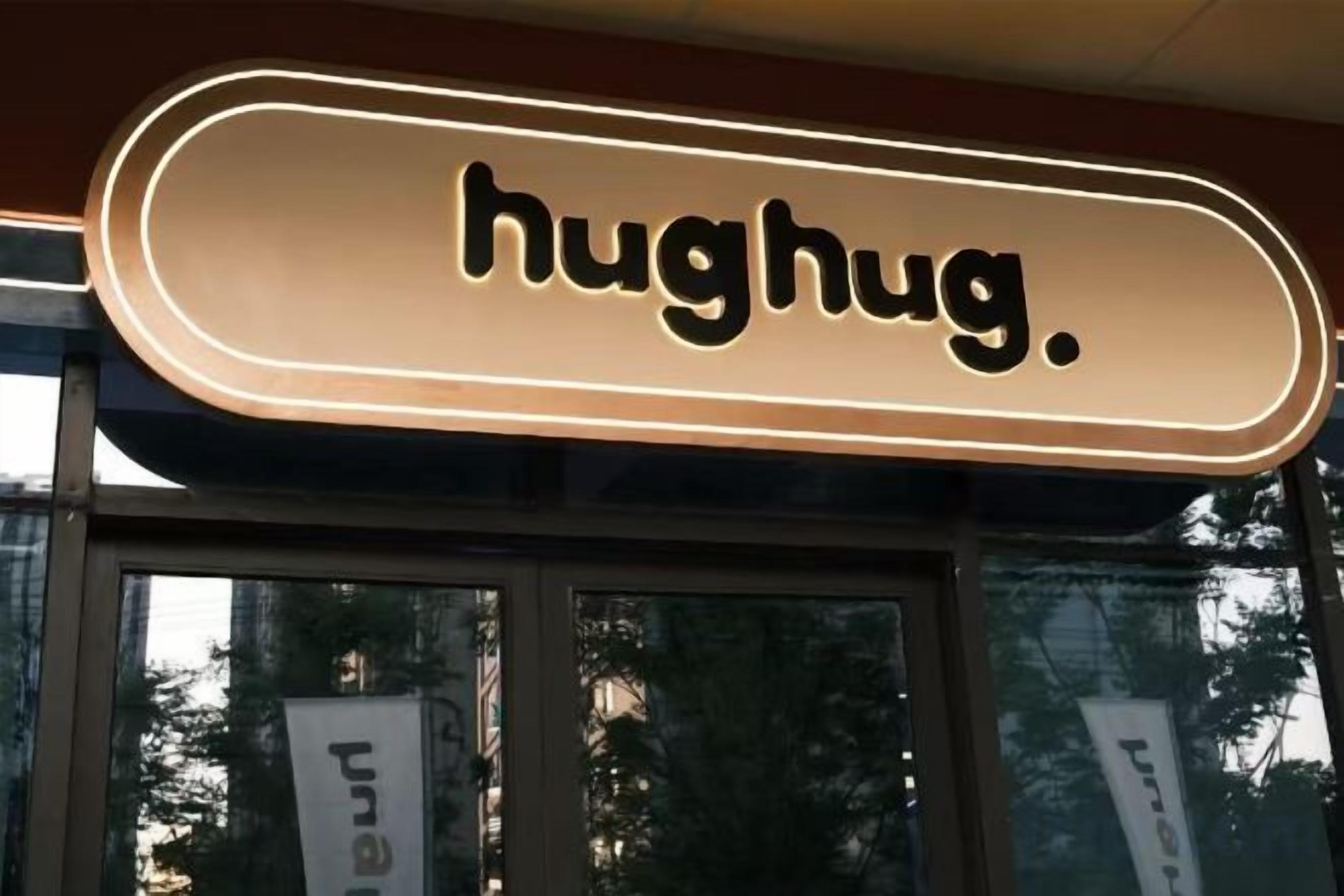 A sign with the word 'hughug.'