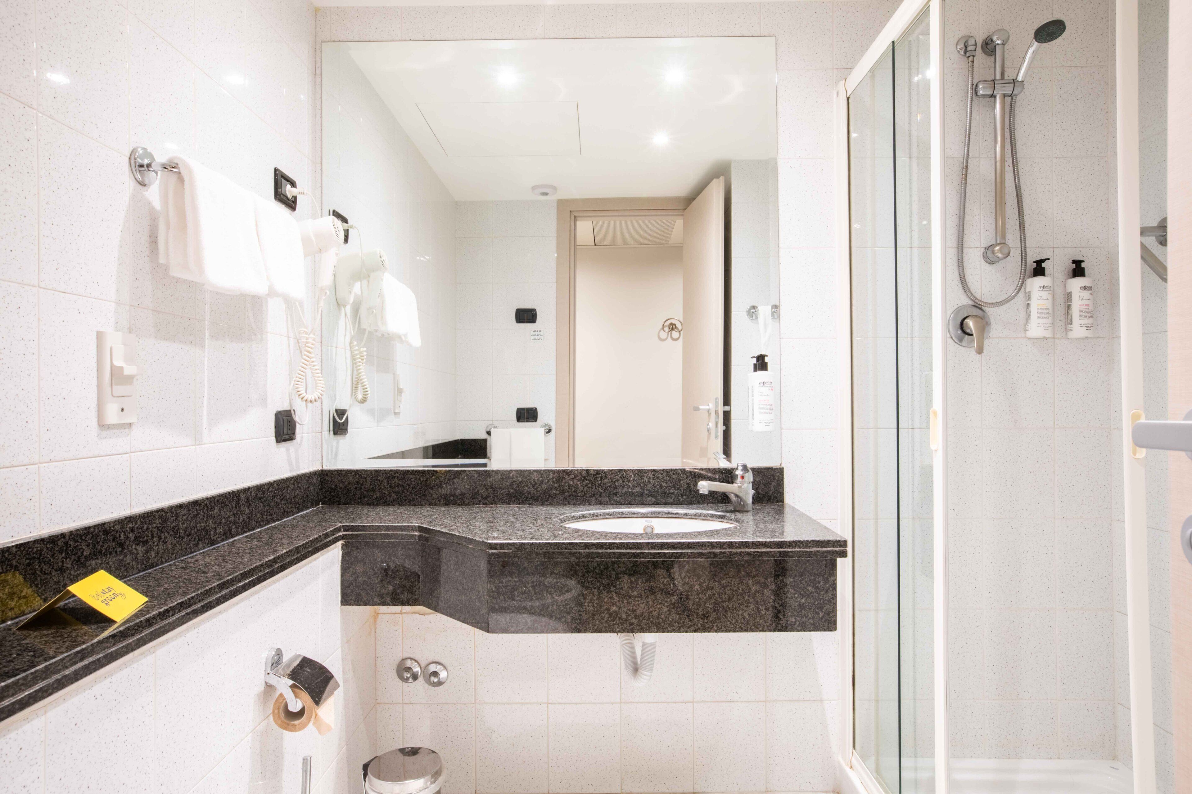 free toiletries, hair dryer, bidet, towels