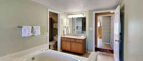 Condo (#644 - No Pets) | Bathroom | Hair dryer, towels, toilet paper