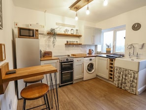 Fridge, electric kettle, toaster, cookware/dishes/utensils