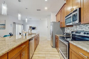 Fridge, microwave, oven, stovetop - Gated Storey Lake Home | Private Pool | Mini-Golf, Lazy River & Pier (Kissimmee)