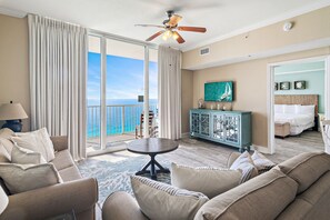 TV, books - High-end retreat with balcony, sweeping Gulf views, pools & hot tubs (Panama City Beach)