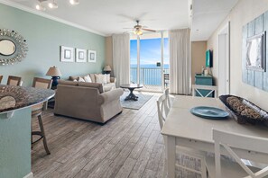 TV, books - High-end retreat with balcony, sweeping Gulf views, pools & hot tubs (Panama City Beach)