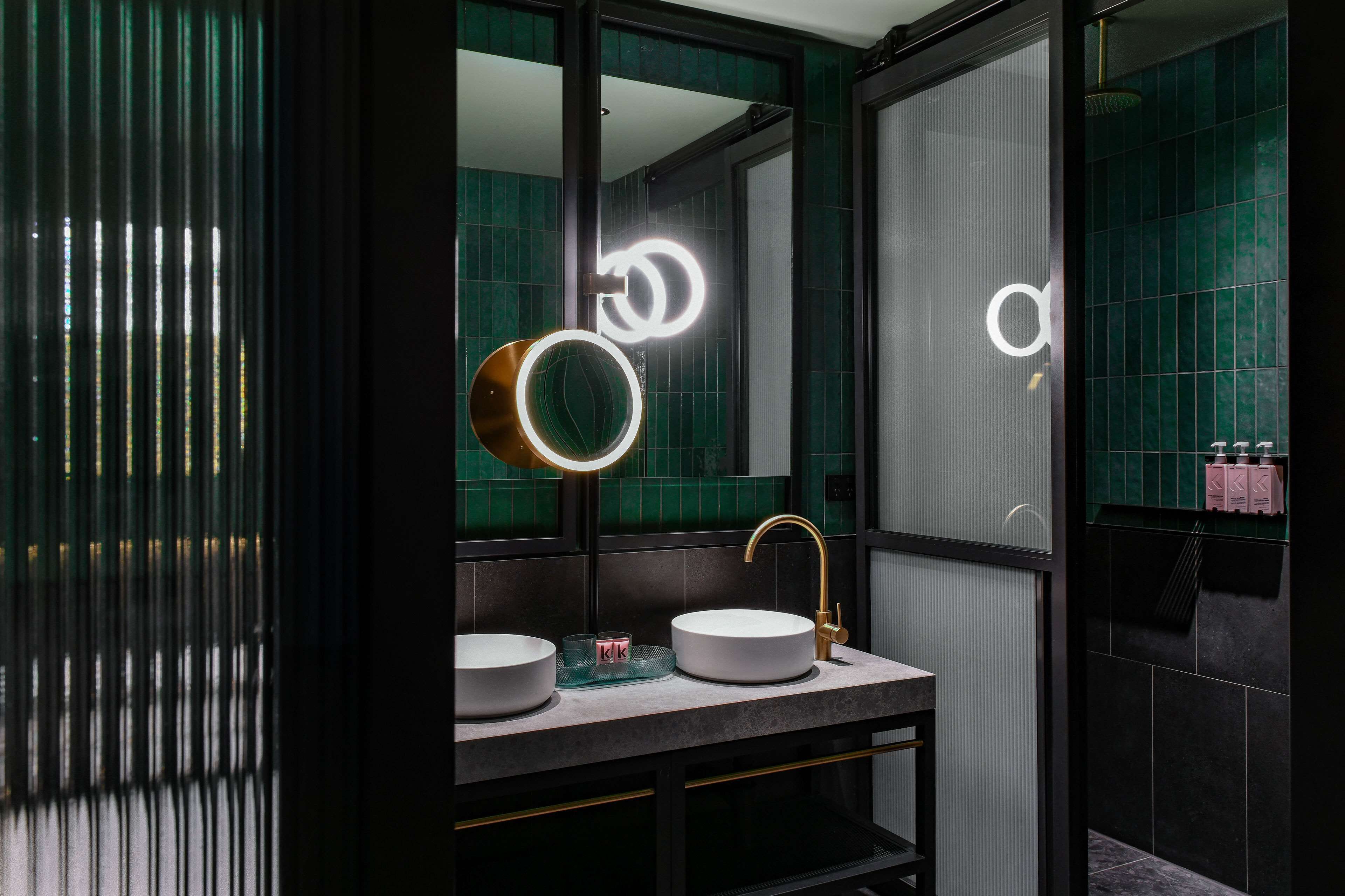 designer toiletries, hair dryer, bathrobes, towels