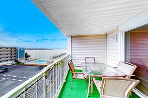 Outdoor dining - Bay View Condo with Balcony, AC, WiFi, Washer/Dryer & Community Pool (Ocean City)