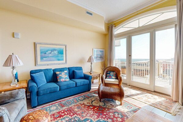 Televisión, chimenea, reproductor de DVD y libros 