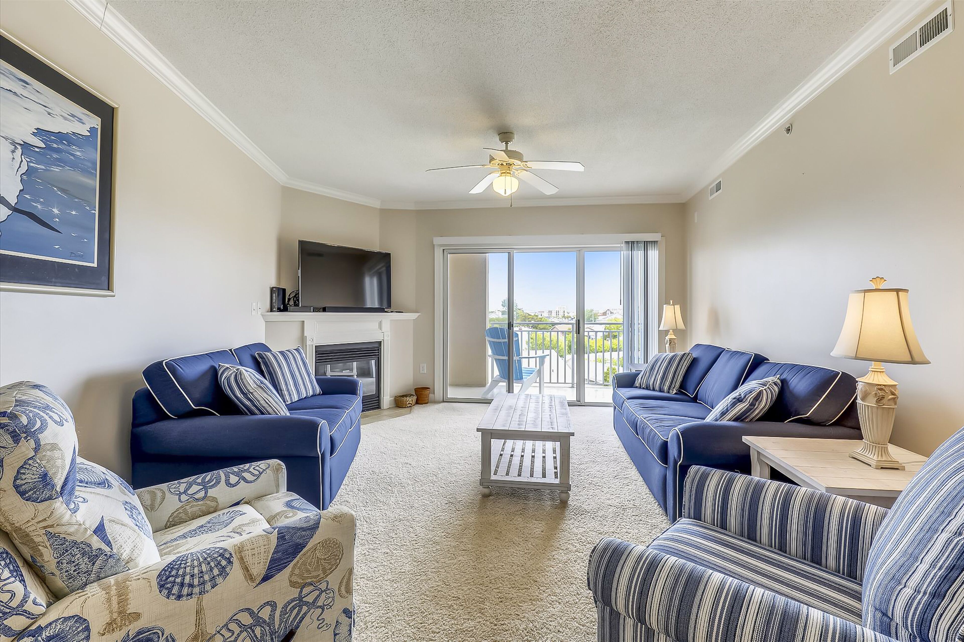 Télévision, cheminée, livres