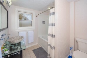 Bathtub, hair dryer, towels