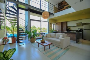 Exclusive-Apartment, 3 Schlafzimmer | Wohnzimmer | 40-Zoll-Flachbildfernseher mit Digitalempfang, Fernseher