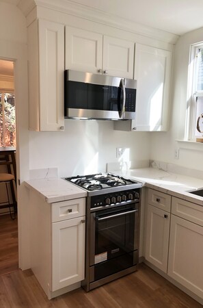 Microwave, coffee/tea maker, cookware/dishes/utensils