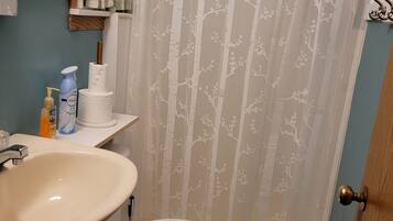 Shower, towels, soap, shampoo
