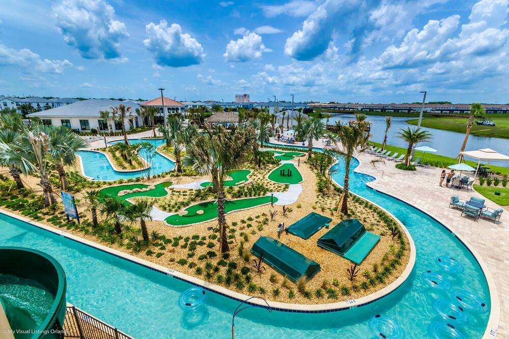 Purple Mouse at Storey Lake by Shine Villas<br><br>Beautiful 5-bedroom, 4-bathroom townhome with private splash pool sleeping up to 10<br><br>Located in one of Orlando\'s newest and finest resort communities: Storey Lake. <br><br>Less than 10 minutes from Walt Disney World and right next to shopping and restaurants. <br><br>NO RESORT FEES with us! Free access to the resort facilities! Shine Villas never charge resort fees!<br>These comprise some of the best facilities in Florida, including sports courts, resort pool, Children’s splash zone/pad areas pool slides, playgrounds, and a gym as well as much more!<br>The primary booker must be 25 years or older (we are unable to accommodate groups of primarily under 25-year-olds or those from the local vicinity), however, family groups with children aged 0 -100 are welcome!<br><br>One of the newest resorts in Orlando. To stay at Storey Lake is to enjoy a premium resort experience. <br>This home away from home features a fully equipped gourmet kitchen with granite countertops and stainless-steel appliances. <br>The open floor concept allows everyone to be together while cooking, watching TV, or dipping in and out of the private pool area! <br><br>Bedroom Configuration<br><br>First Floor <br>1. Queen Bedroom, sleeps 2<br>2. Twin Bedroom with 2 x Twin Beds, sleeps 2<br>- Bathroom with walk-in shower<br>Second Floor / Upstairs<br>3. Master Suite – King Bed Suite Bed with attached bathroom, sleeps 2<br>4. Master King Bedroom, sleeps 2<br>5. Twin Bedroom – 2 x twin beds, sleeps 2<br>- Family Bathroom<br> <br>- The third bedroom has a Queen bed – Star Wars Snores!<br>- Bedroom four has 2 x twin beds – Mickey Haven<br>Rooms 3 and 4 share a bathroom meaning plenty of room for all the family. <br>- Each bedroom has its own TV<br><br>This home has its own private splash pool and covered outdoor sitting space with loungers chairs. A fully equipped laundry room and high-speed free (of course) wi-fi are also available.<br>Linens, towels, and overnight/starter amenities will set you up before your first trip to restock the large Fridge and Freezer in this self-catering paradise. <br>Optional pool heat is available for $35/day including tax for 5 days. The minimum activation is $175 which includes up to 5 days of heating, add $35 for additional days. We recommend adding pool heat to your reservation during the Winter and Spring months. Booked at least 24 hours prior to arrival, there will be no activation fee. Where booked later than this or closer to arrival, an activation fee may apply.<br>A BBQ grill with a new propane tank can be rented for your use please ask for more information about grill options. <br><br>More About the Resort<br>Storey Lake is the perfect setting for building your family memories. <br>World-class resort amenities and comforts make the perfect retreat from the convenient access to nearby theme parks, shopping, dining, and entertainment. Storey Lake’s amenities make it the premier destination in Orlando. <br>Naturally, with a modern, high-end resort property, a fully-equipped kitchen with appliances stone countertops, and all the appliances you might need for a resort stay. High-speed Internet Wi-Fi access of course and cable TV, linens, and towels as well as a starter selection of hotel-style bathroom amenities to get you going on your self-catered trip. <br><br>Noteworthy but not exhaustive:-<br>The entrance to Storey Lake is secured by a gate and guardhouse. <br>The Hideaway - Clubhouse: <br>There are no fees for clubhouse use (which includes a fitness center, resort pool, hot tub, kiddie splash pad, half basketball court, sand volleyball, lazy river, tiki bar, and ice cream shop!). <br>Kayaking and mini-golf are available for a small charge.<br><br>Some common questions answered about Storey Lake Resort!<br><br>- Are the pools heated yea- round? <br><br>Absolutely! All pools and the lazy river are heated all year round!<br><br>- What are the pool hours? <br><br>The pools open at 9 am and close at 9 pm daily.<br><br>- What are the minimum height restrictions for the waterslides? <br><br>Riders must be at least 36 inches tall and only one rider at a time. <br><br>- Are there activities at the Resort? <br><br>Yes and the activities change monthly!<br><br>Does the Mini-Golf and Kayaking cost extra? <br><br>- Mini-golf at the time of writing is $5/kids and $7/adults. Kayak rental is $15/30 mins or $20/hour. Sometimes there are specials too. <br><br>- What time does the Tiki Bar and Ice Cream Shop open/close? <br><br>They open at 11 am and close 8 pm daily.<br><br> <br><br>- What time does the Clubhouse open/close?<br><br>9 am – 9 pm daily.<br><br>- What time does the Fitness Center open/close? <br><br>5 am – 12 am daily.<br><br>The occupancy limit for this property applies 24 hours a day and only occupants listed on the agreement may attend the home. All reservations require completion of an electronically signed rental agreement, agreeing to the conditions of the rental which includes that no parties are permitted at this home and the community operates quiet hours outside after 9PM. <br><br>ID is required to access the community. Guests are required to provide identification in the form of an ‘ID selfie\', confirm the names and ages of all adults who will be attending the property, as well as completing a signed rental agreement’. Child names (not ages) are also required for entrance into the community. This check-in / pre arrival information must be completed within 24 hours of placing the reservation or prior to arrival (which-ever is the sooner’). Purple Mouse, sleeps 10 at Storey Lake by Shine Villas #991