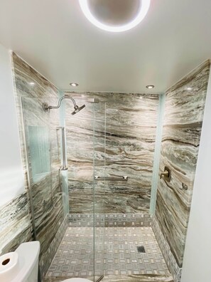 Bathtub, hair dryer, towels
