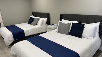 Premium bedding, down comforters, individually decorated