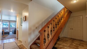 A staircase with wooden railings leading to a landing. - Interlaken #19 - 3 Bedroom 3 Bathroom Unit (June Lake)