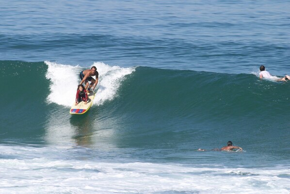 A person surfing on a wave.