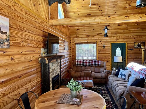 Beautiful cabin with fireplace and wrap around porch and private upstair balcony