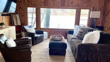 Smart TV, fireplace, DVD player, books
