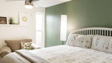 1 bedroom, desk, iron/ironing board, travel crib