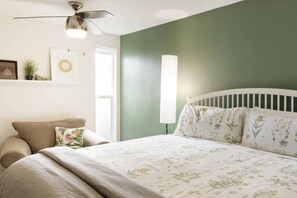 1 bedroom, desk, iron/ironing board, travel crib