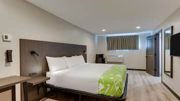 Escrivaninha, cortinas blackout, Wi-Fi de cortesia, roupa de cama