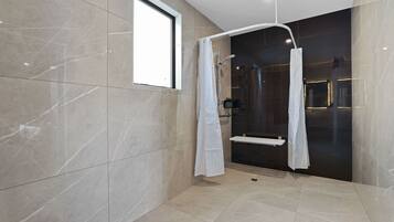 Deluxe Room, Accessible | Bathroom | Shower, rainfall showerhead, free toiletries, hair dryer