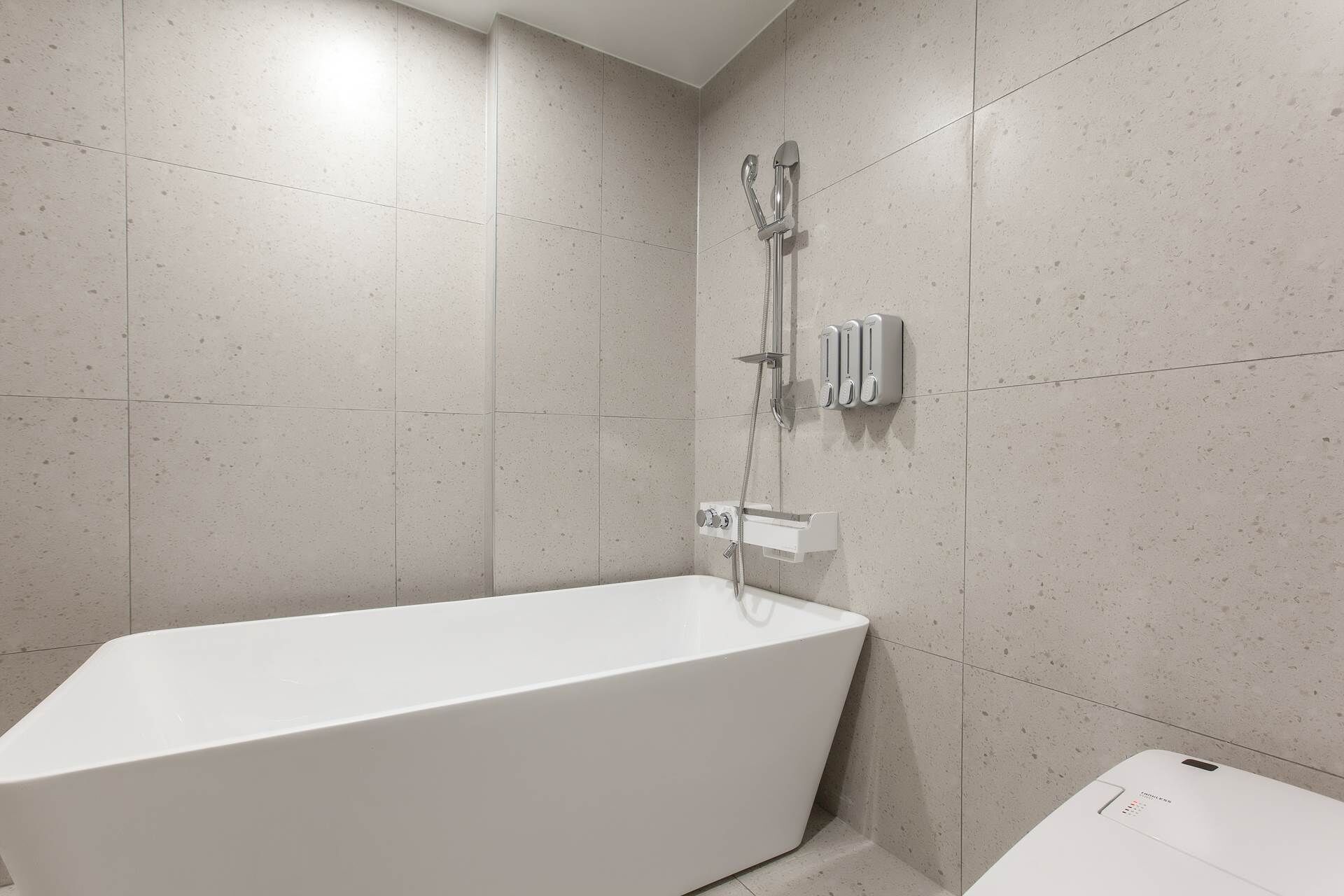 Separate bathtub and shower, hair dryer, bathrobes, bidet