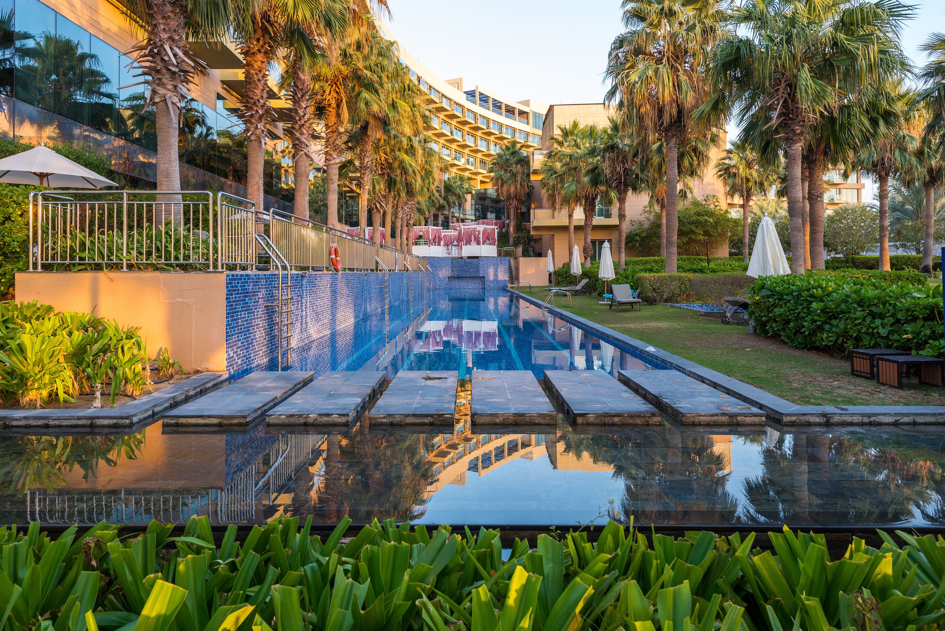 Outdoor pool, pool umbrellas, sun loungers