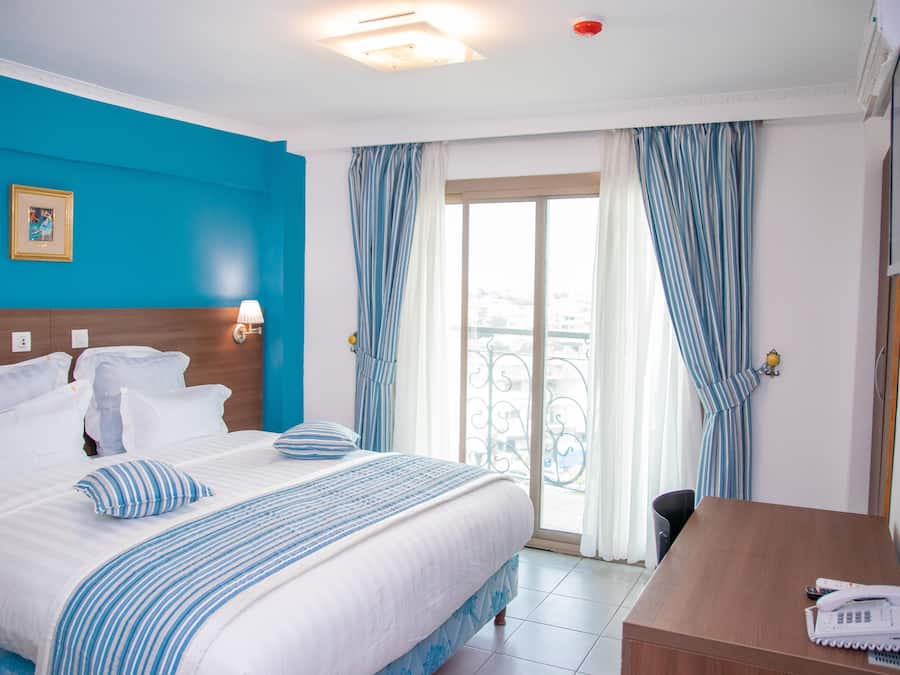 Standaard kamer | Lakens van Egyptisch katoen, luxe beddengoed, donsdekens, een minibar